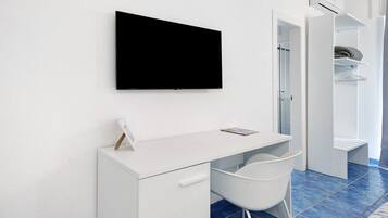 1 chambre, fer et planche Ă repasser, Wi-Fi, draps fournis