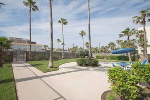 Outdoor dining - Beachfront 3BR condo with Gulf views, pool, hot tub & beach patio! (South Padre Island)