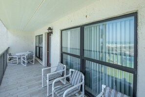Outdoor dining - Beachfront condo with Gulf views, 3 pools, hot tubs & walkable! (South Padre Island)