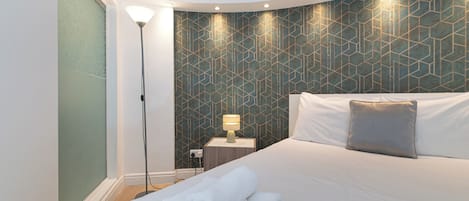 1 chambre, fer et planche Ă repasser, Wi-Fi gratuit, draps fournis