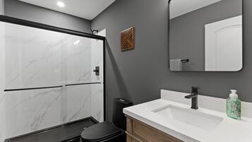 Shower, towels, soap, shampoo