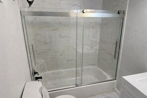 Shower, jetted bath, towels, soap -  4-BR, 3 bath in Atlanta,  3.6 mi from MB Stadium. 8 beds 1 queen sofa sleeper. (Atlanta)