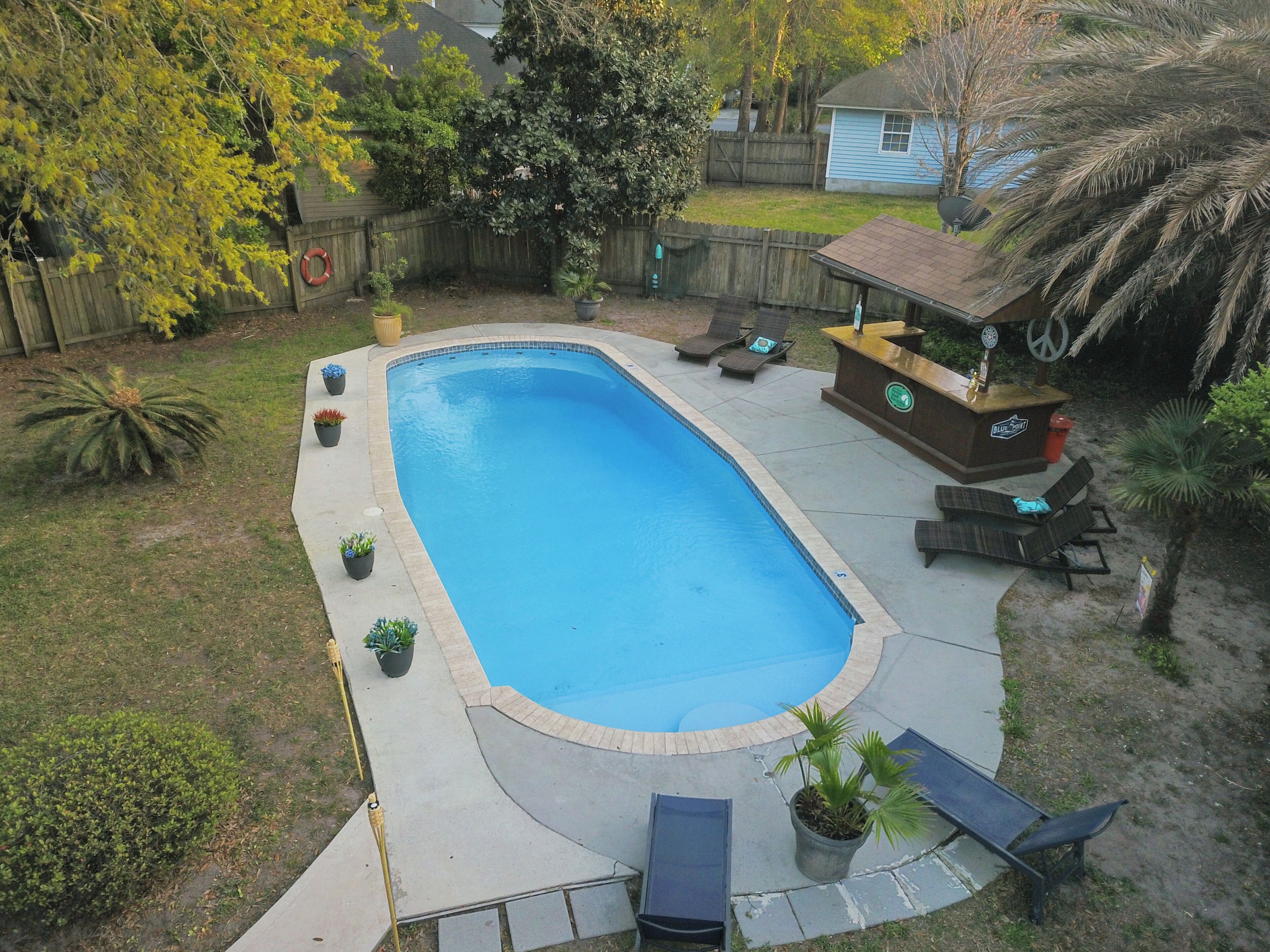 38ft resort style upgraded curved in ground pool: aerial view