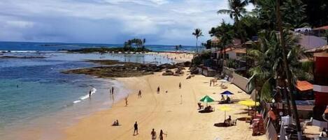 En la playa, traslado desde/hacia la playa, sombrillas, toallas de playa