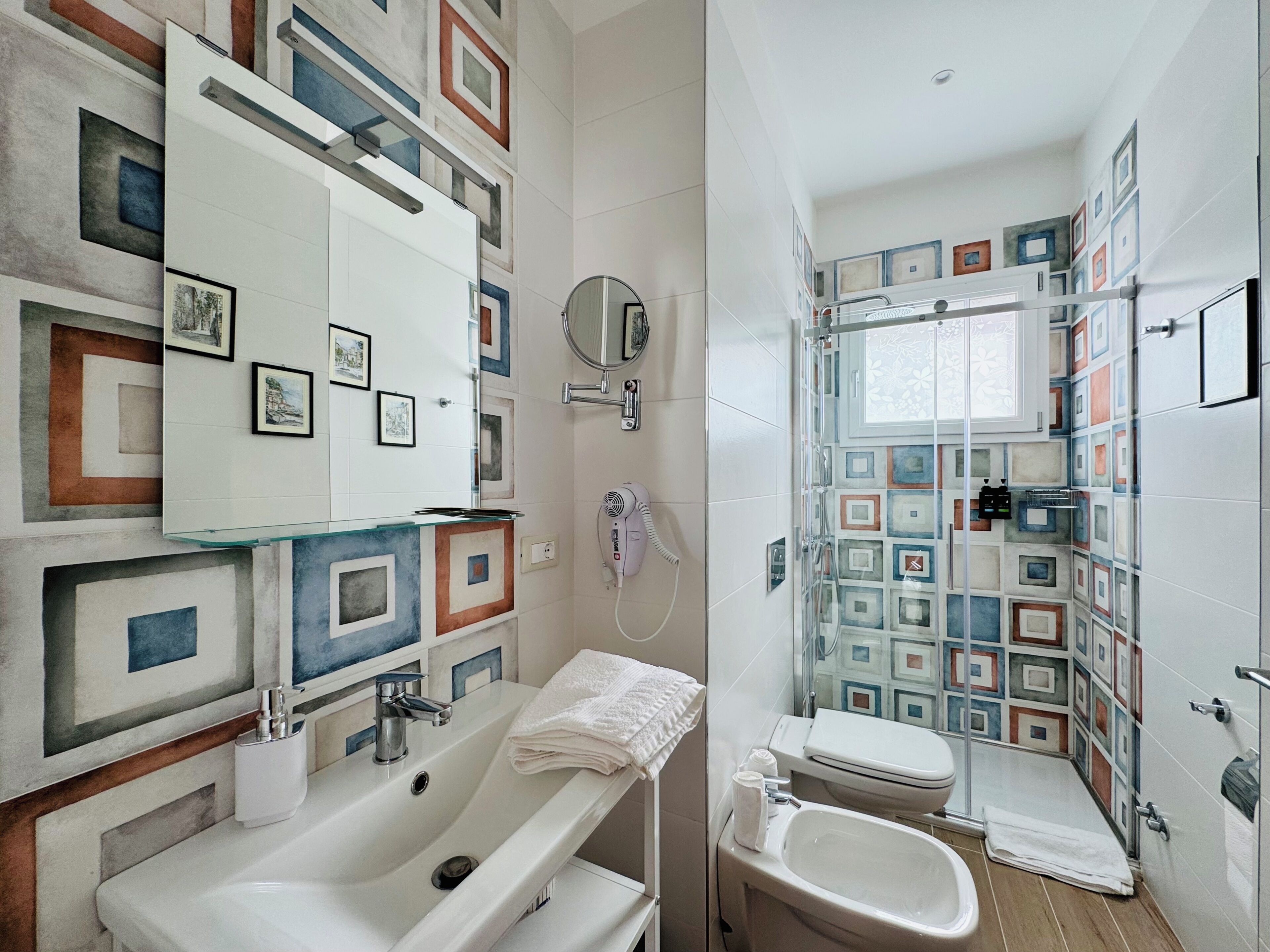 Suite, City View | Bathroom | Shower, free toiletries, hair dryer, towels
