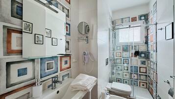 Suite, City View | Bathroom | Shower, free toiletries, hair dryer, towels