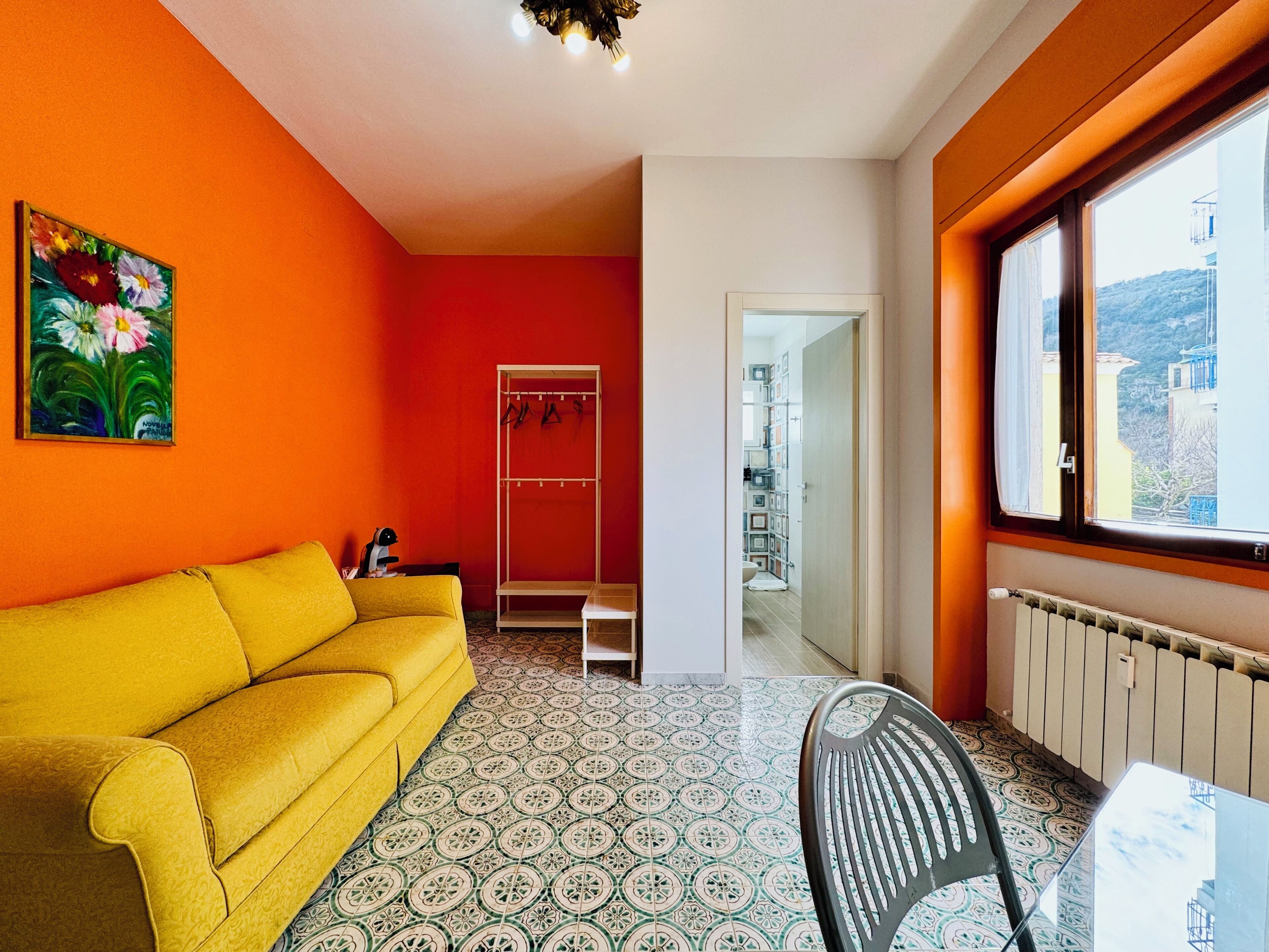 Suite, City View | Living area | 32-inch flat-screen TV with digital channels