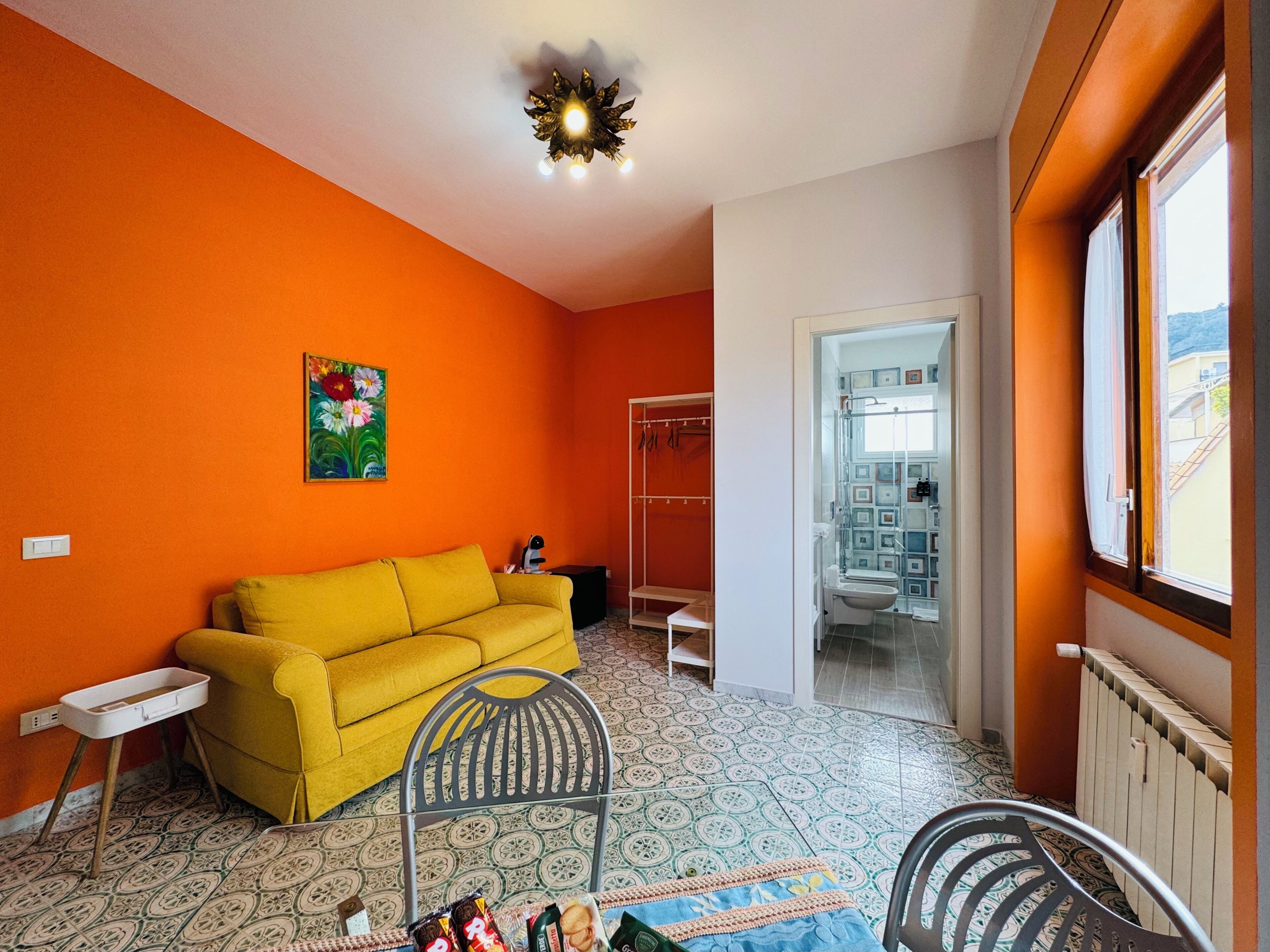 Suite, City View | Living area | 32-inch flat-screen TV with digital channels