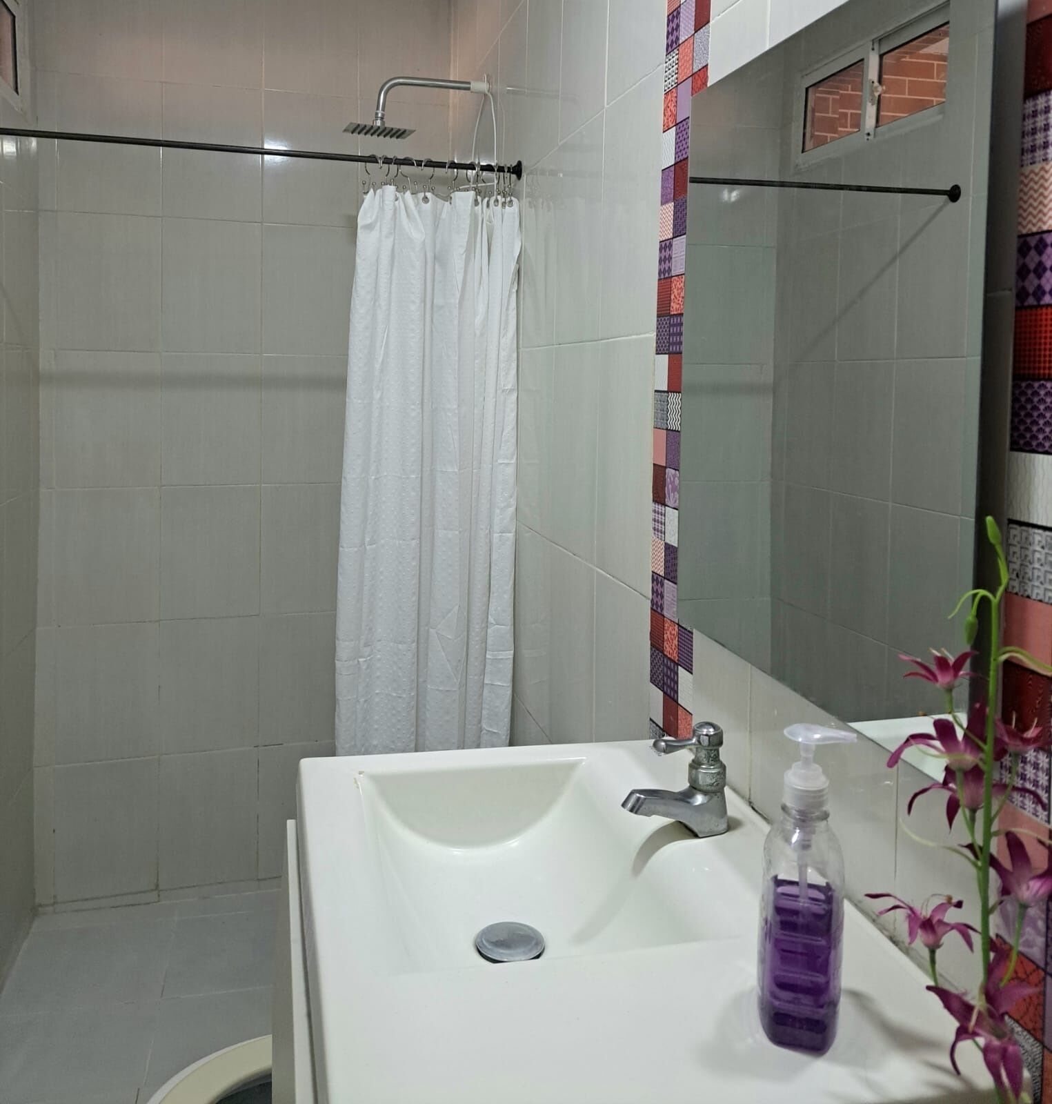 Shower, towels, soap, toilet paper