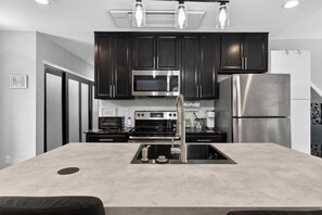Fridge, microwave, oven, stovetop - Stylish 1BR Retreat Near Downtown & NC State (Raleigh)