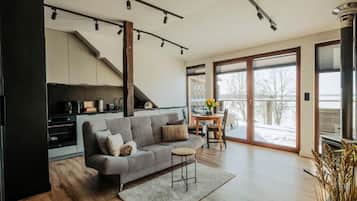 Appartamento Comfort, balcone, vista lago | Area soggiorno