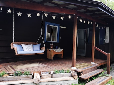 Terrace/patio. Self contained cabin for couples or groups in the wonderful town of Zeballos