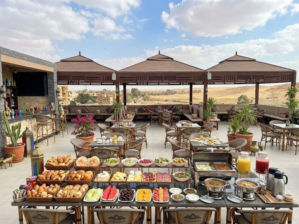 An outdoor dining area with multiple tables, umbrellas, and a variety of food items.