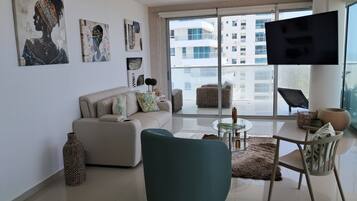 Deluxe Apartment, Balcony, Beach View | Living area