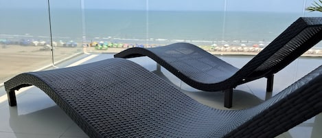 Deluxe Apartment, Balcony, Beach View | Property grounds