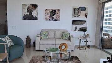 Deluxe Apartment, Balcony, Beach View | Living area