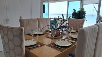 Deluxe Apartment, Balcony, Beach View | Dining