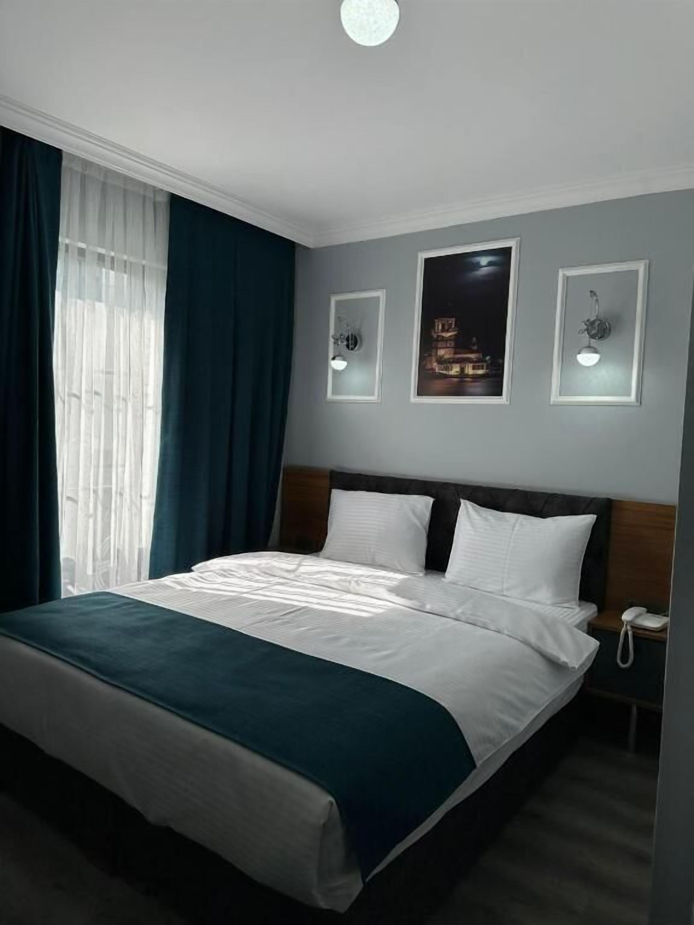 Quarto casal luxo, sacada, vista para a cidade