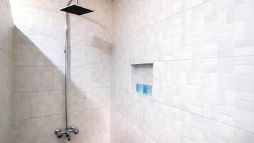 Shower, free toiletries, slippers, towels