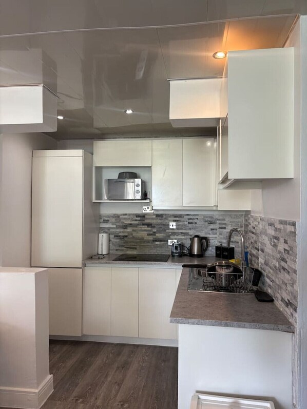 Fridge, microwave, stovetop, coffee/tea maker - 2BR Beachfront Penthouse | Steps to Ocho Rios Bay (Ocho Rios)