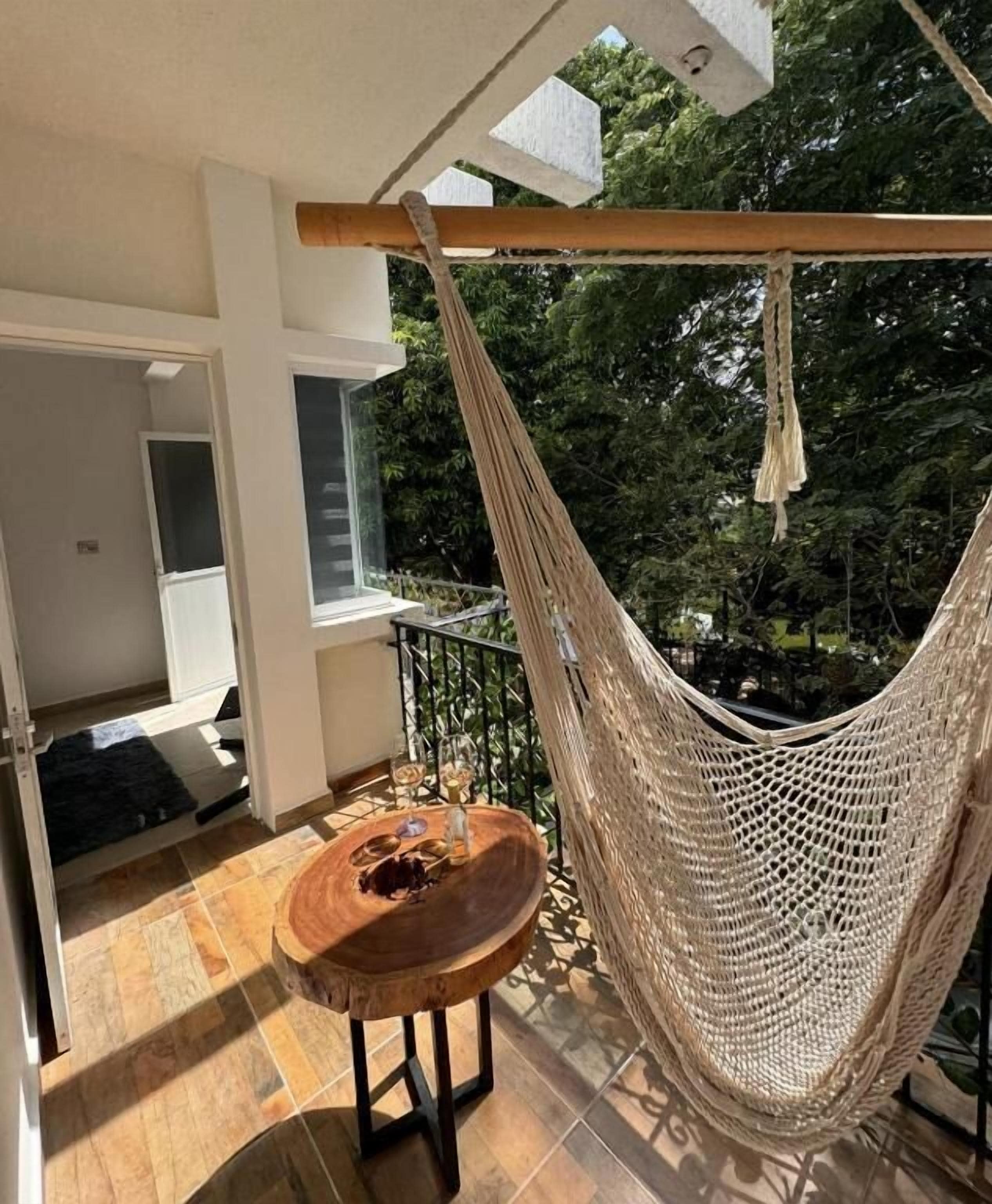 Suite ejecutiva, baño privado, vista al jardín | Terraza o patio