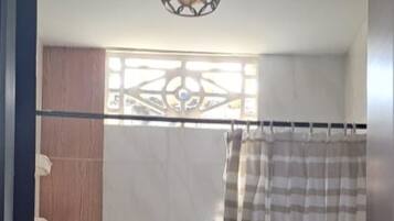 Shower, towels, soap, toilet paper