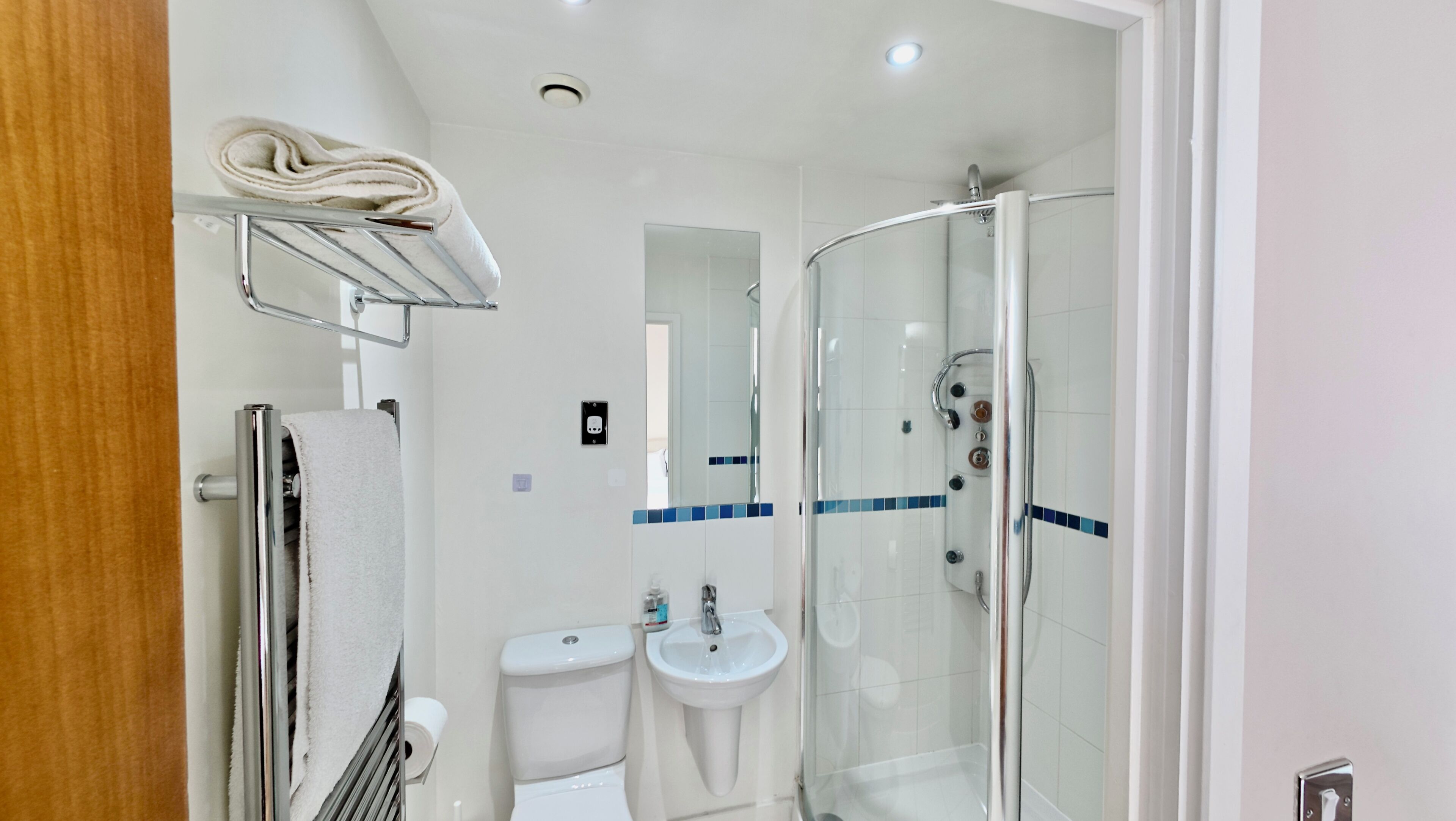 Shower, towels, soap, toilet paper