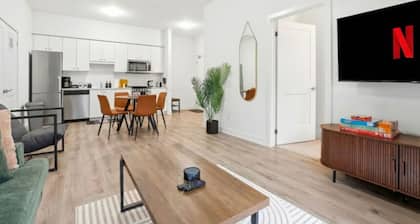 2BR Modern Condo | High Ceilings, Ensuite & Patio