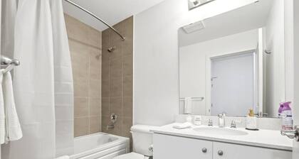 2BR Modern Condo | High Ceilings, Ensuite & Patio