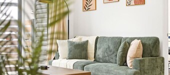 2BR Modern Condo | High Ceilings, Ensuite & Patio