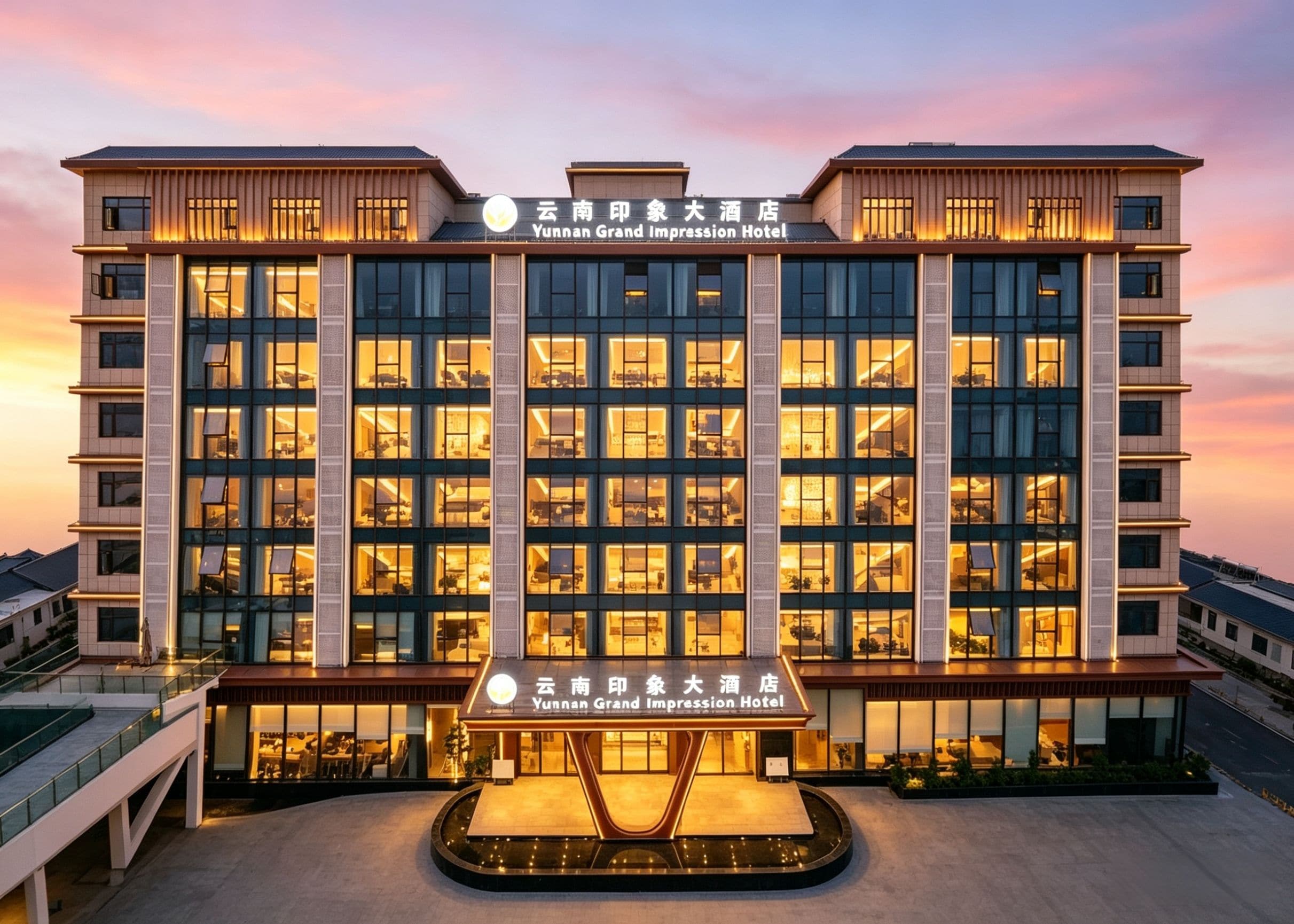 A hotel with a modern facade, multiple floors, and a central entrance.