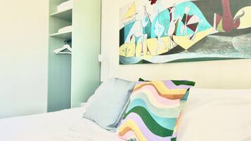 2 bedrooms, desk, iron/ironing board, travel crib