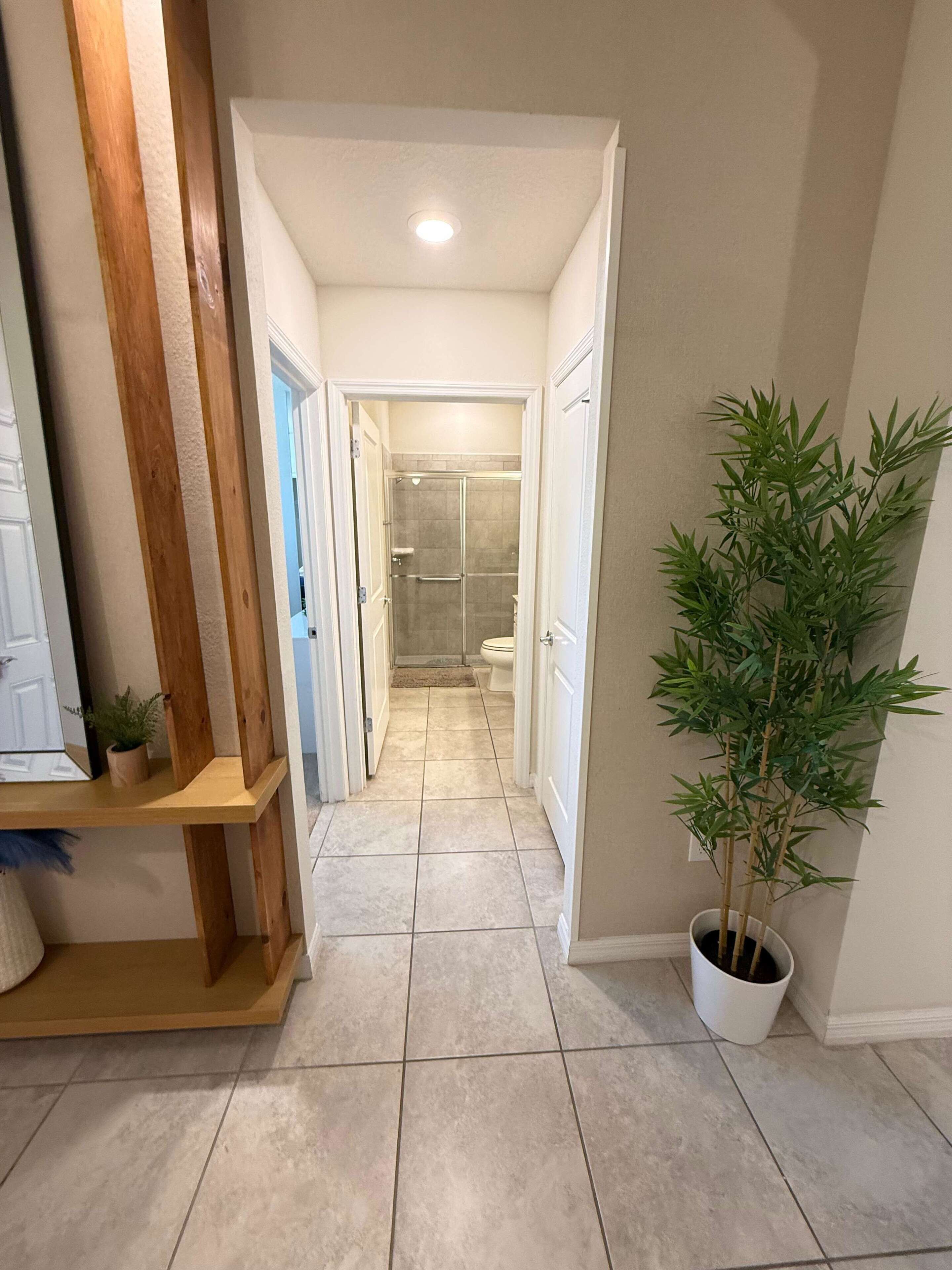 Shower, hair dryer, towels, shampoo