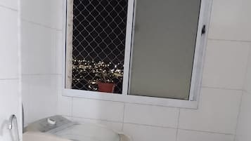Shower, towels, soap, toilet paper
