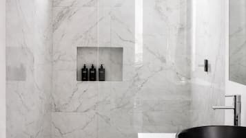 Luxury Apartment, Balcony, Garden View | Bathroom | Shower, hair dryer, towels, soap