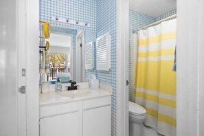 Shower, hair dryer, towels, shampoo