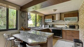 Comfort House, 3 Bedrooms, Patio, Garden View | Private kitchen | Coffee/tea maker, toaster, freezer