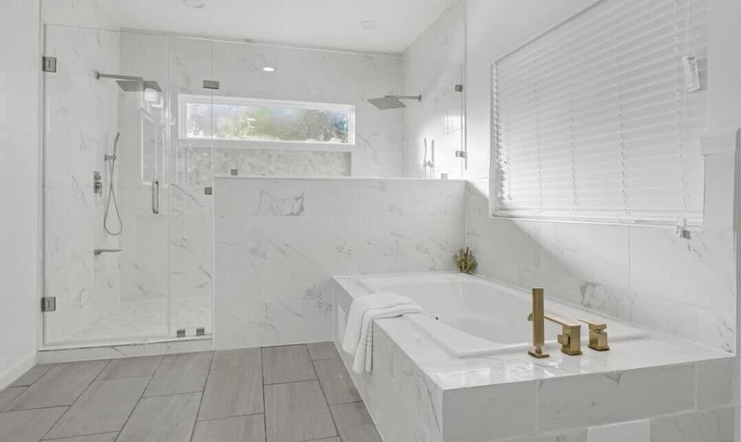 Shower, jetted tub, towels, soap