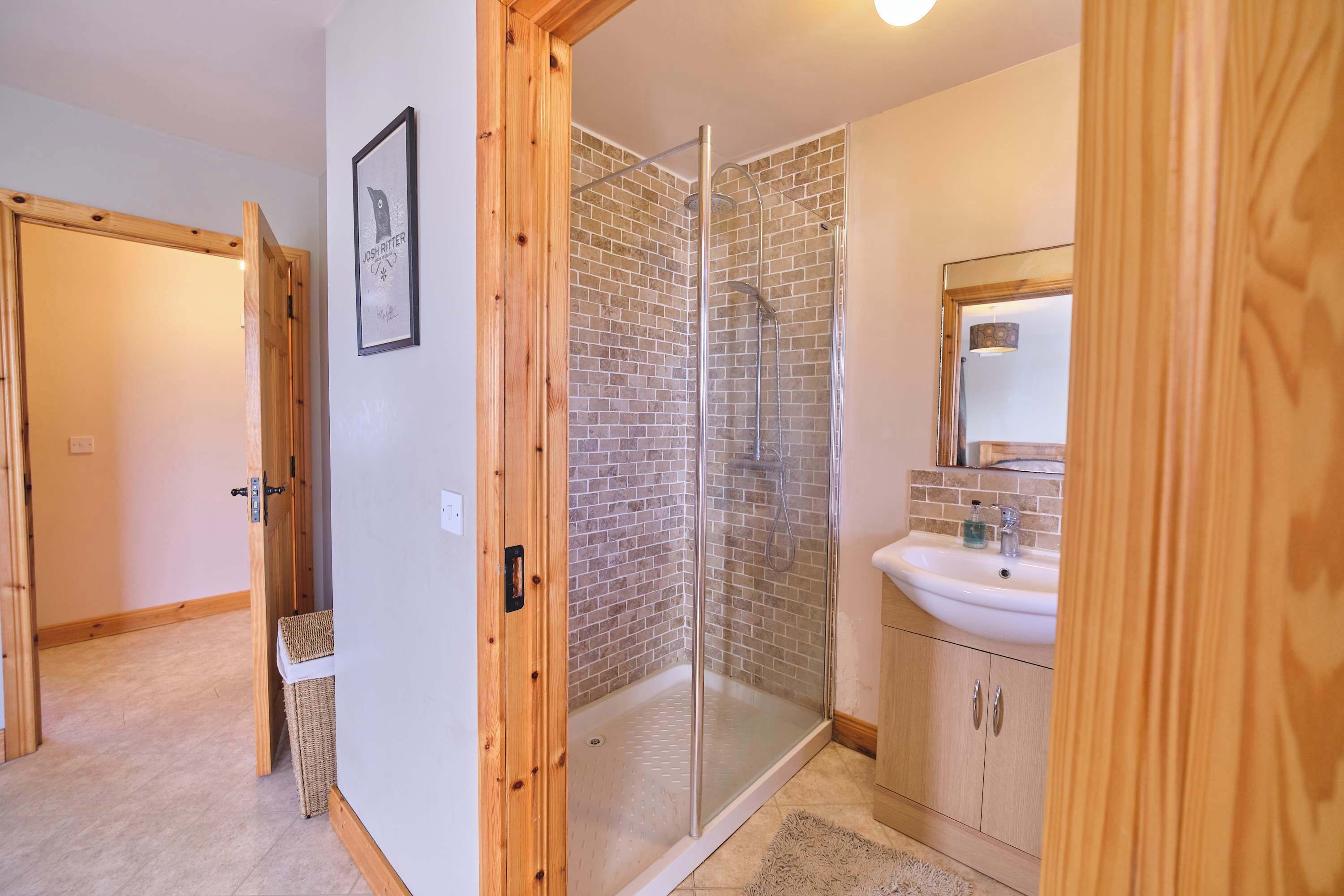 Shower, hair dryer, towels, shampoo