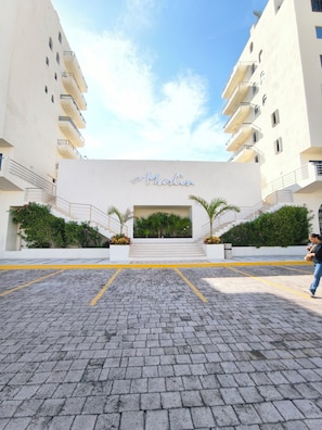 A building with a sign reading 'Villa Marlin' and a paved entrance area with steps leading up to the entrance. -  Cancún Caribe Soul studio /walk on beach/ Top Location (Cancún)