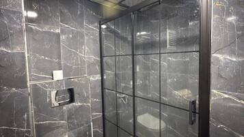 Shower, towels, soap, shampoo