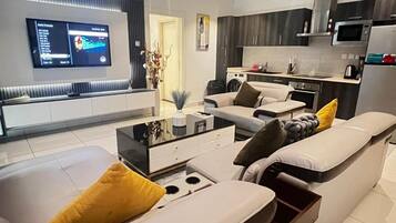 Apartamento Confort, 2 habitaciones, vistas al jardín | Zona de estar