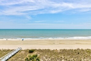 On the beach - Relax in this premier beachfront 1-bedroom condo in Carolina Beach. (Carolina Beach)