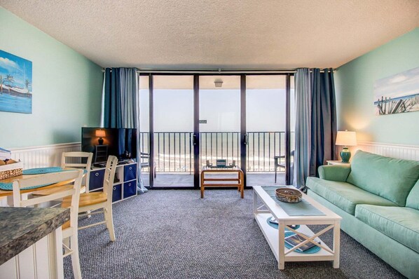 TV, offices - Oceanfront bliss awaits at 0506 Seaside Escape in Carolina Beach! (Carolina Beach)