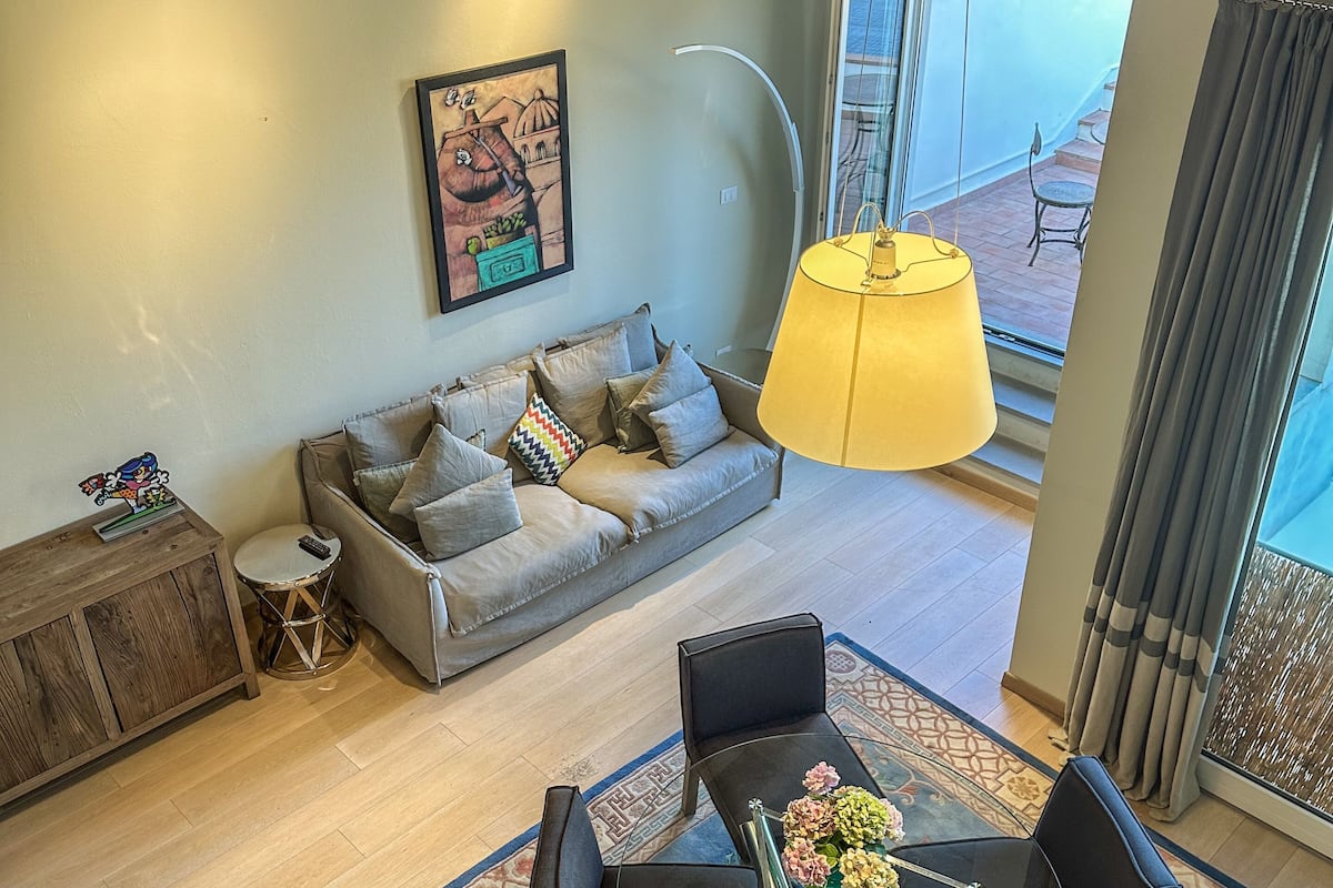 Design Apartment, 2 Bedrooms | Living area | 42-inch flat-screen TV with cable channels, TV, heated floors