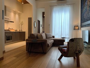 Superior Apartment, 2 Bedrooms (Blue Klein) | Living area | 42-inch flat-screen TV with cable channels, TV, heated floors - Florence Art Apartments (Florence)