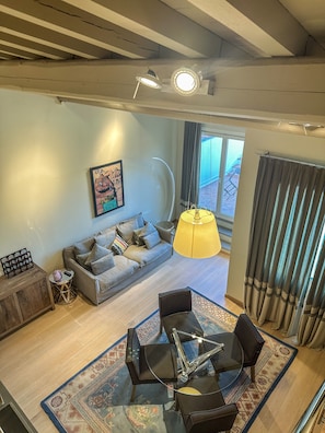 Design Apartment, 2 Bedrooms | Living area | 42-inch flat-screen TV with cable channels, TV, heated floors