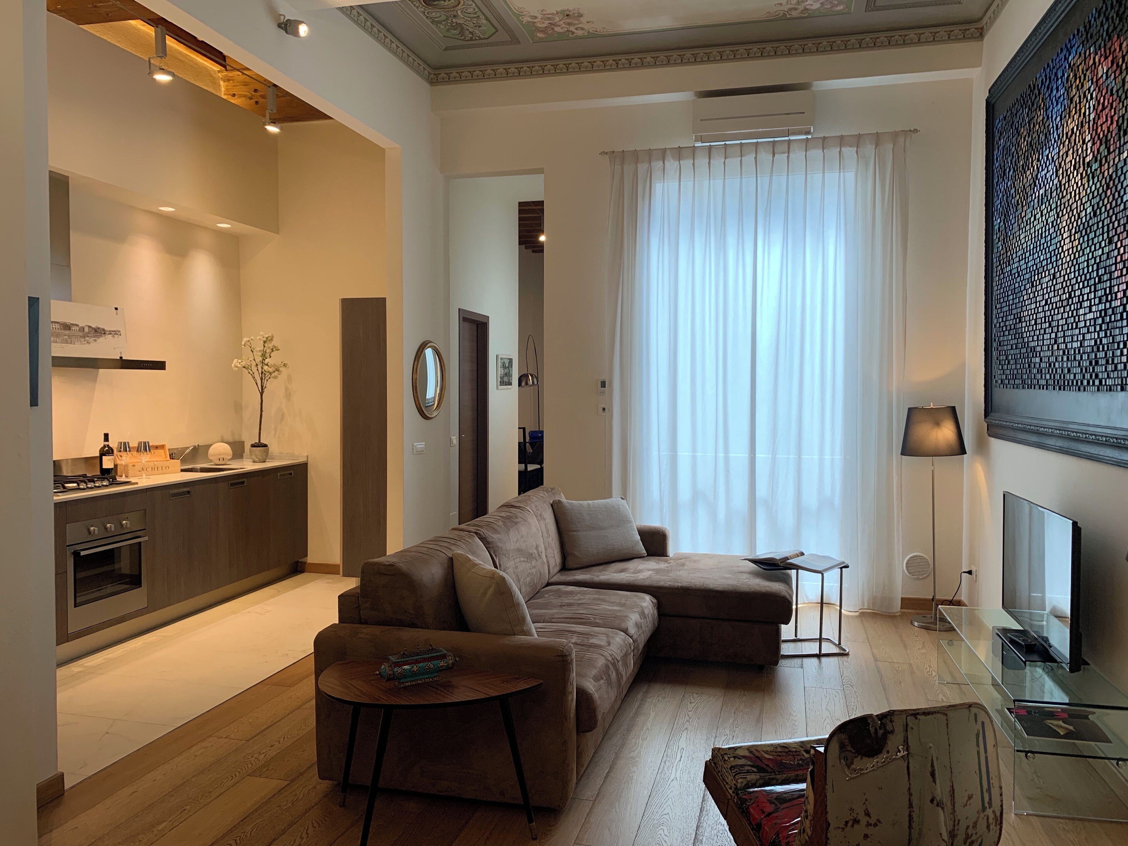 Superior Apartment, 2 Bedrooms (Blue Klein) | Living area | 42-inch flat-screen TV with cable channels, TV, heated floors