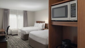 A hotel room with two beds, a desk, a chair, a coffee maker, and a microwave. - Fairfield Inn & Suites Tampa Westshore / Airport (Tampa)