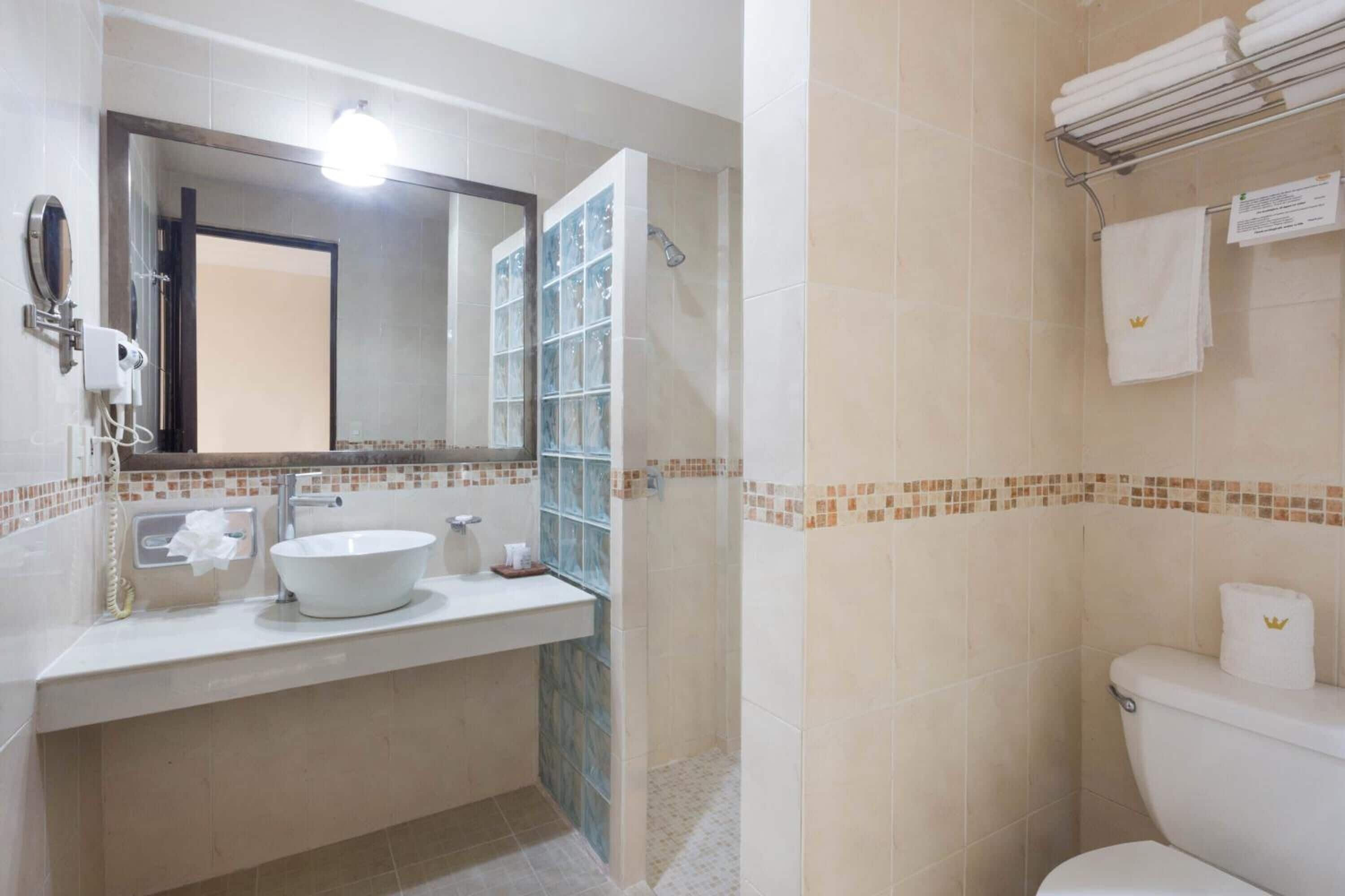 shower, free toiletries, hair dryer, towels